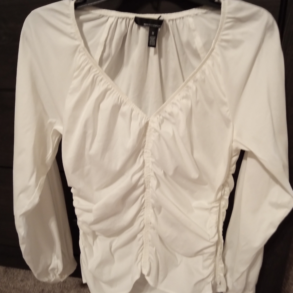 White House Black Market Size M, in white.